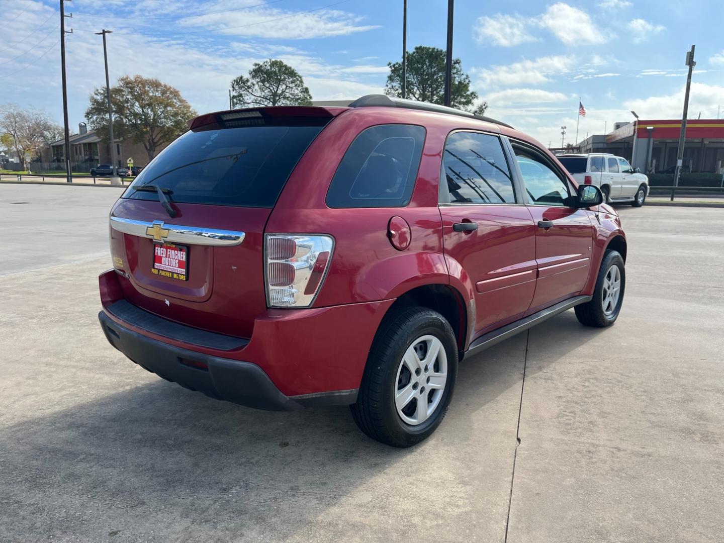 2006 red /TAN Chevrolet Equinox LS 2WD (2CNDL13F366) with an 3.4L V6 OHV 12V engine, 5-Speed Automatic transmission, located at 14700 Tomball Parkway 249, Houston, TX, 77086, (281) 444-2200, 29.928619, -95.504074 - Photo#6